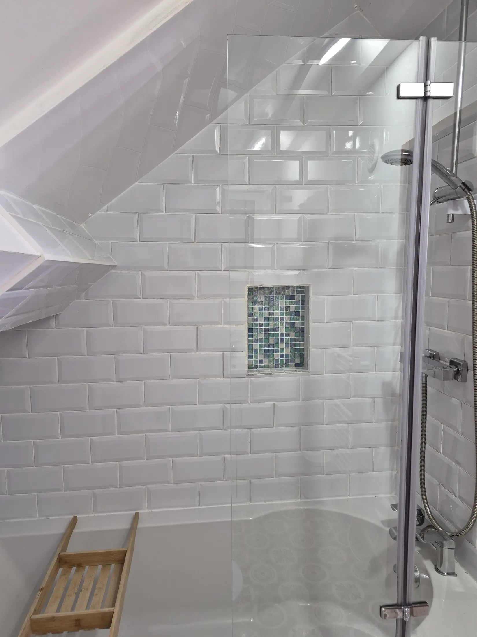 Shower over the bath in Bridge Cottage