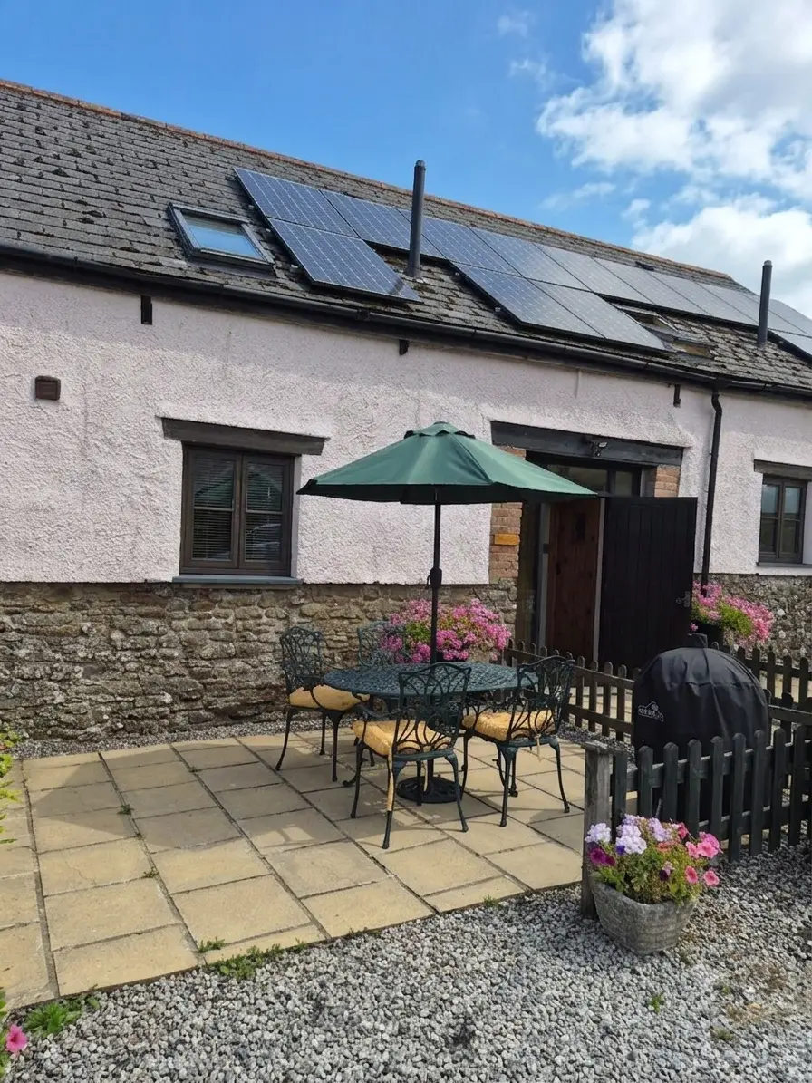Outdoor seating at Bridge Cottage