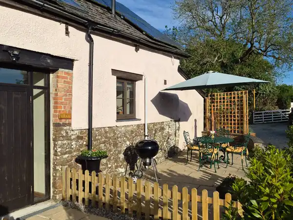 Brook Cottage and its private outdoor seating area